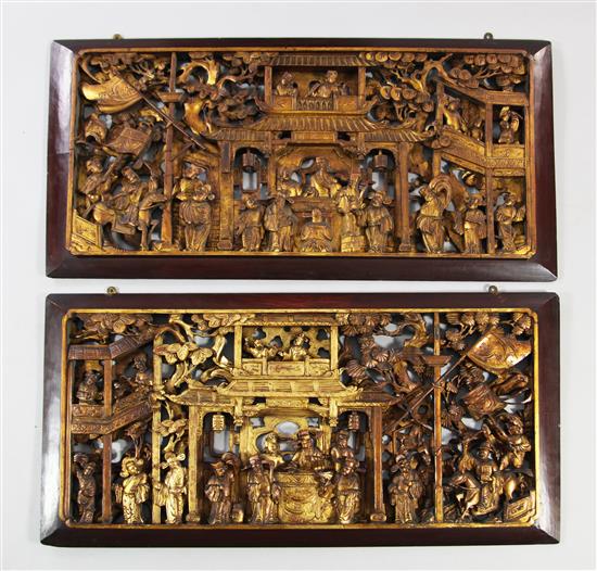 A pair of Chinese carved giltwood panels, late 19th / early 20th century, 84.5 x 42cm